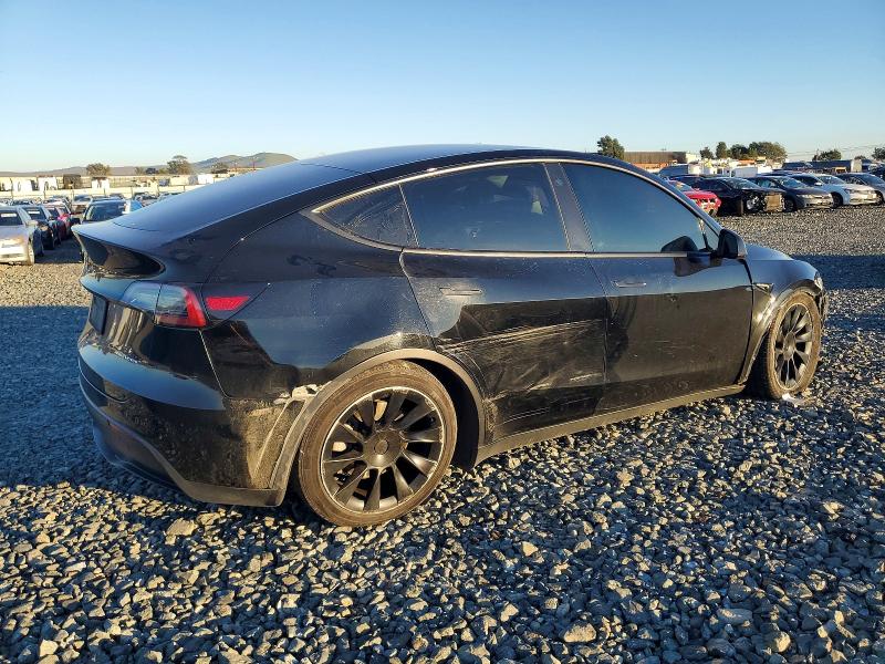 Photo 3 from auction – 2022 TESLA MODEL Y with VIN 7SAYGDEE3NF555532