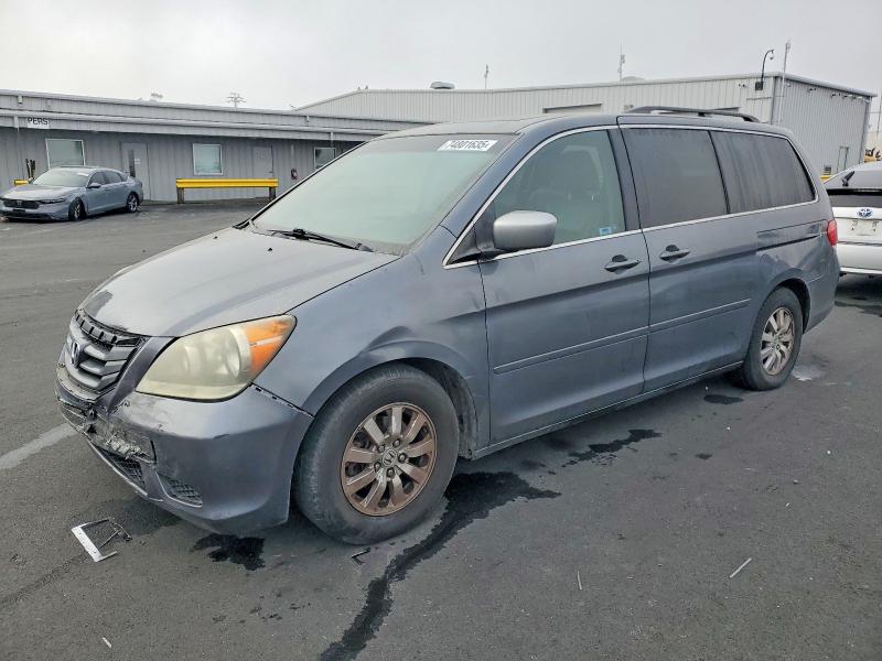 HONDA ODYSSEY EX 2010 with VIN 5FNRL3H63AB085296 - Photo from auction