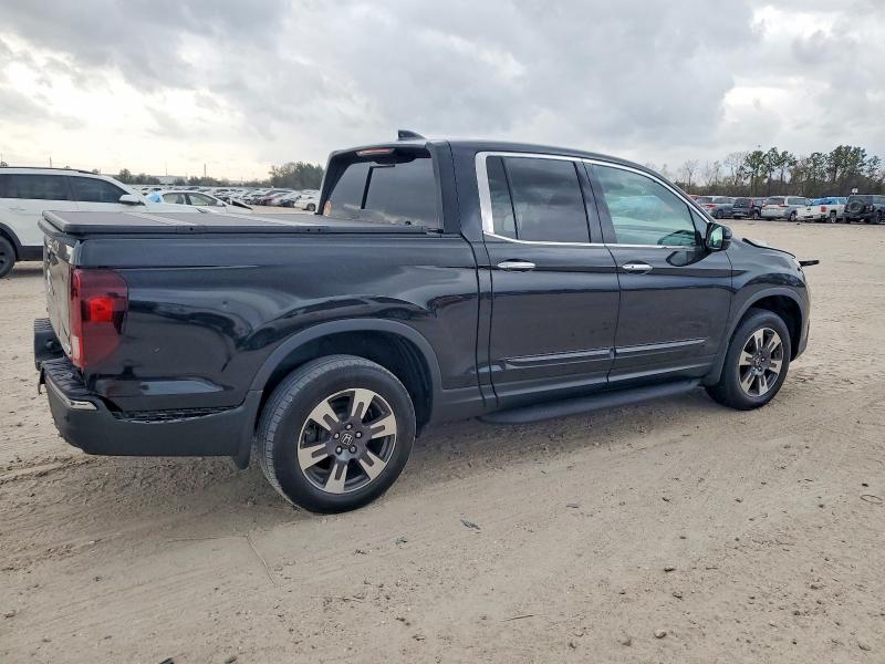 Photo 3 from auction – 2019 HONDA RIDGELINE with VIN 5FPYK3F70KB009652