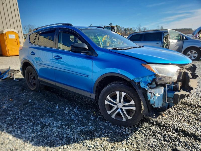 Photo 4 from auction – 2018 TOYOTA RAV4 LE with VIN JTMZFREV4JJ748356