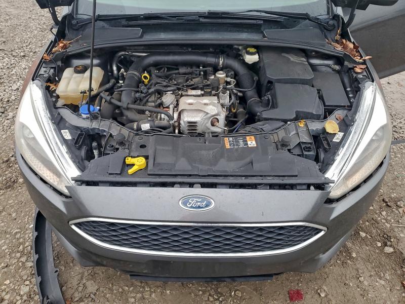 Photo 11 from auction – 2017 FORD FOCUS SE with VIN 1FADP3FE3HL257283