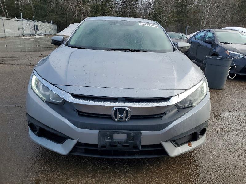 Photo 5 from auction – 2018 HONDA CIVIC with VIN 2HGFC2F84JH006618