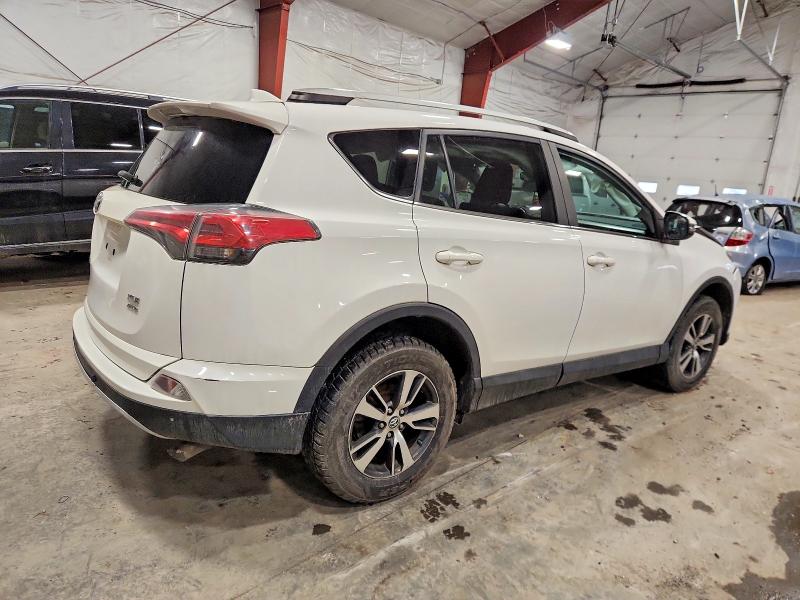 Photo 3 from auction – 2016 TOYOTA RAV4 XLE with VIN 2T3RFREV8GW474539