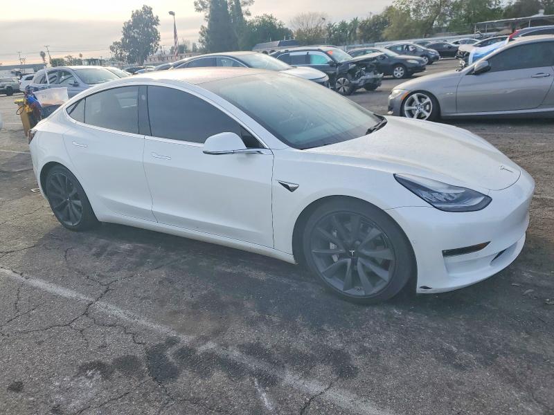 Photo 4 from auction – 2019 TESLA MODEL 3 with VIN 5YJ3E1EA4KF326748