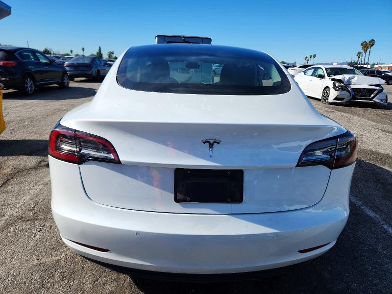 Photo 6 from auction – 2021 TESLA MODEL 3 with VIN 5YJ3E1EA3MF016464