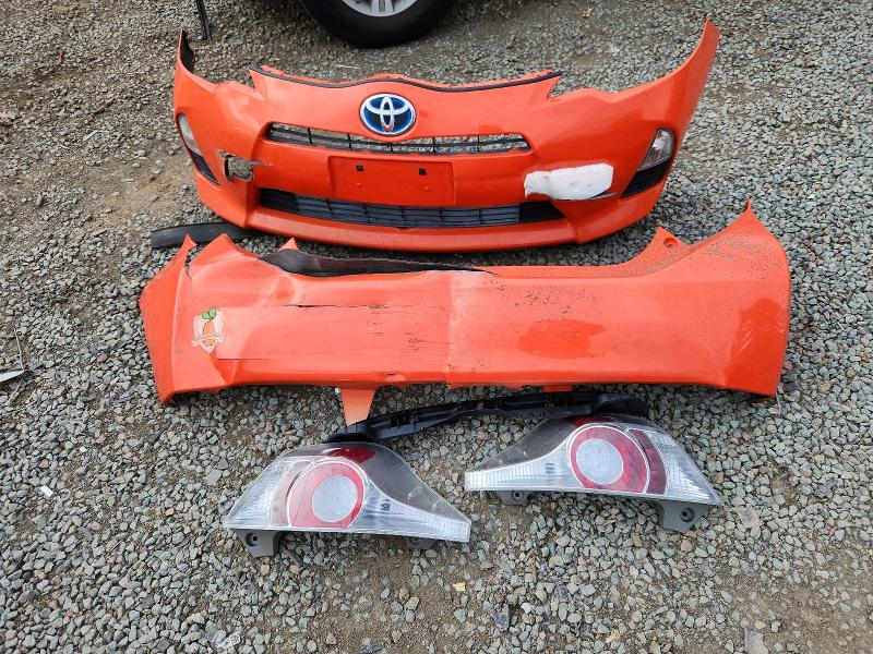 Photo 12 from auction – 2014 TOYOTA PRIUS C with VIN JTDKDTB32E1070302