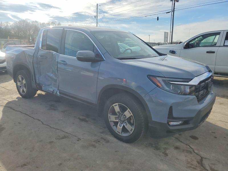 Photo 4 from auction – 2024 HONDA RIDGELINE with VIN 5FPYK3F52RB032861
