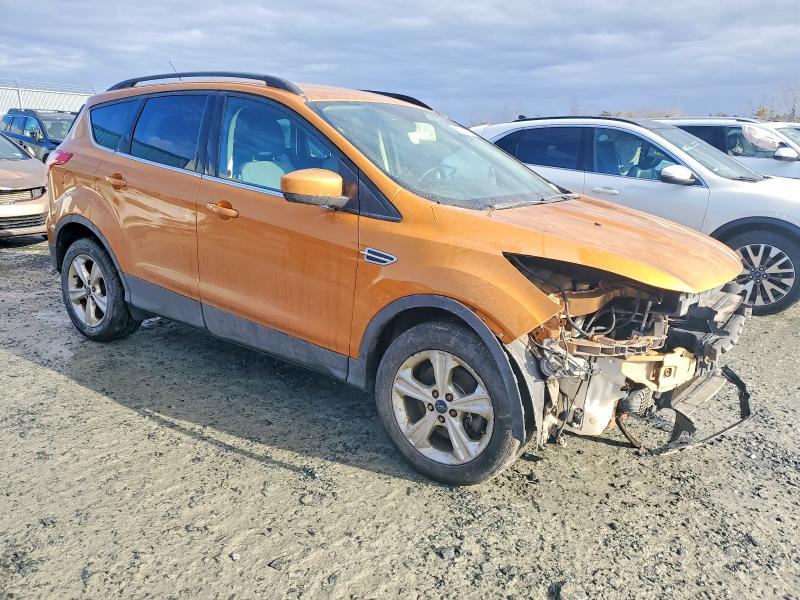 Photo 4 from auction – 2016 FORD ESCAPE SE with VIN 1FMCU9G98GUA41016