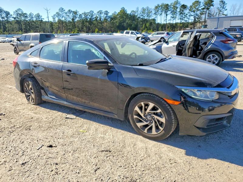Photo 4 from auction – 2018 HONDA CIVIC EX with VIN 19XFC2F73JE003467