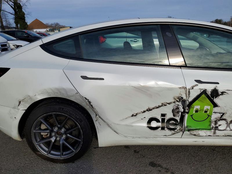 Photo 10 from auction – 2022 TESLA MODEL 3 with VIN 5YJ3E1EAXNF326953