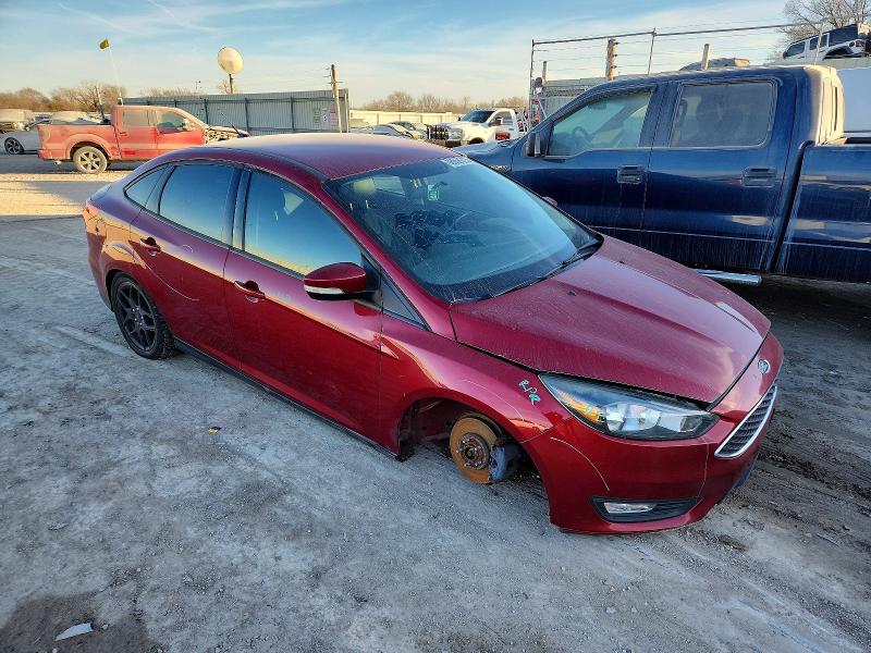 Photo 4 from auction – 2016 FORD FOCUS with VIN 1FADP3F29GL355951