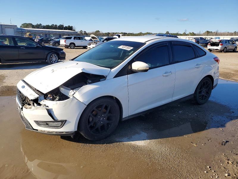 FORD FOCUS 2016 with VIN 1FADP3F21GL299729 - Photo from auction