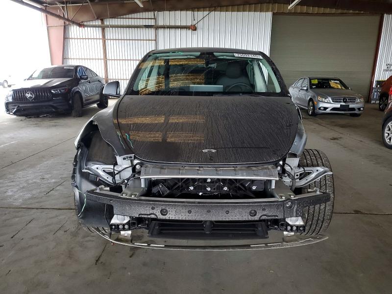 Photo 5 from auction – 2025 TESLA MODEL Y with VIN 7SAYGDEE6SF236668