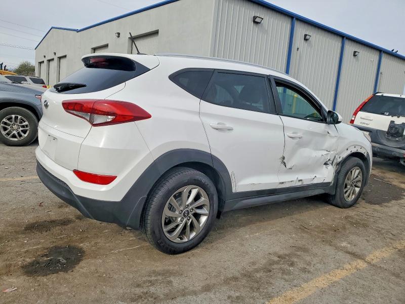 Photo 3 from auction – 2016 HYUNDAI TUCSON LIM with VIN KM8J33A48GU180101