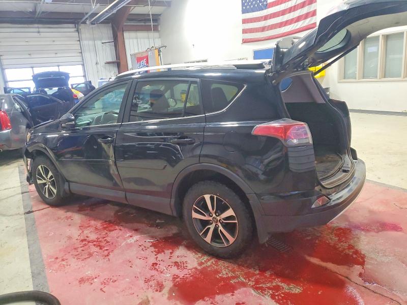 Photo 2 from auction – 2016 TOYOTA RAV4 with VIN 2T3RFREV4GW440064