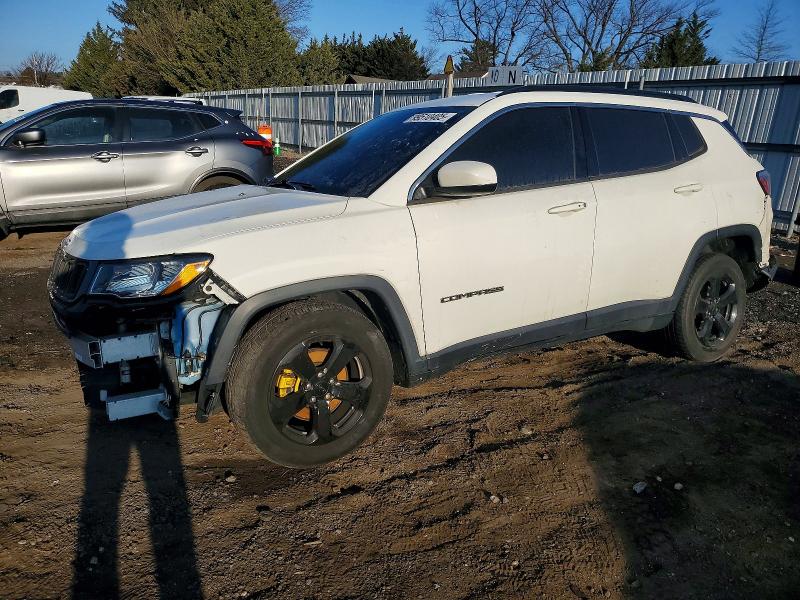JEEP COMPASS 2019 with VIN 3C4NJCBB9KT809747 - Photo from auction