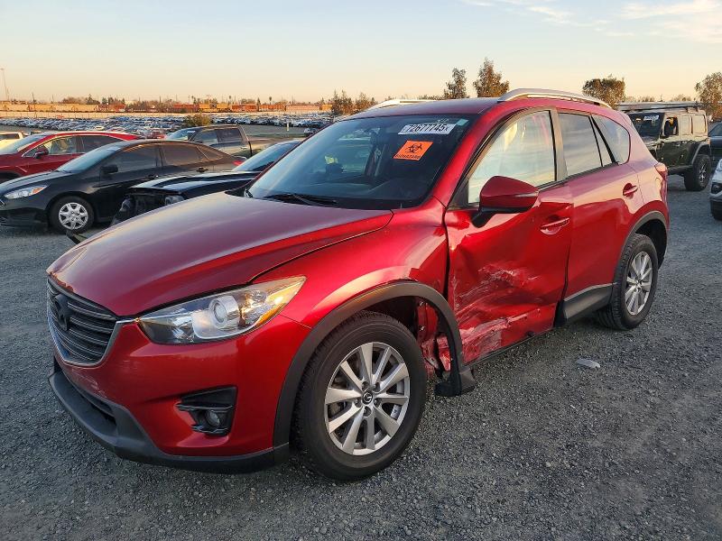 MAZDA CX-5 TOURI 2016 with VIN JM3KE2CY5G0876023 - Photo from auction