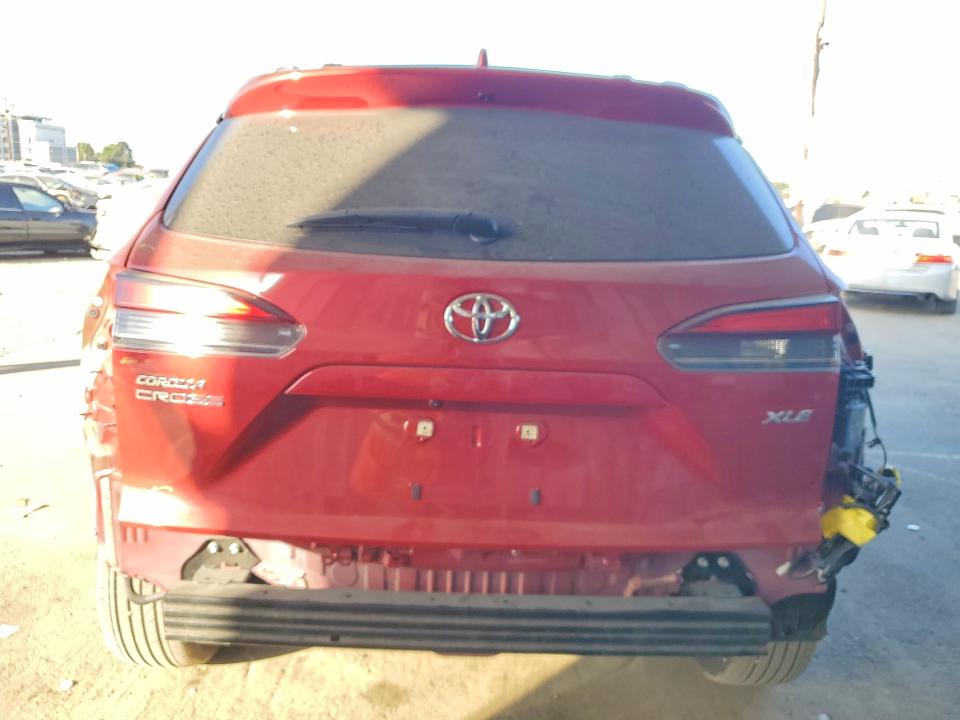 Photo 6 from auction – 2022 TOYOTA COROLLA CROSS with VIN 7MUDAAAG8NV030325