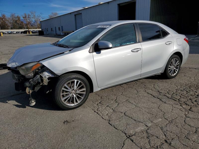 TOYOTA COROLLA L 2014 with VIN 5YFBURHE8EP105917 - Photo from auction