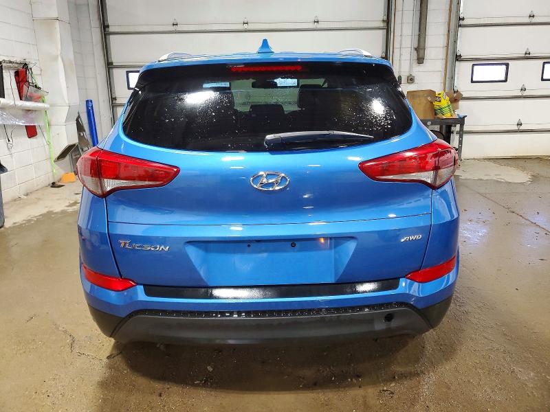 Photo 6 from auction – 2018 HYUNDAI TUCSON SEL with VIN KM8J3CA47JU606819