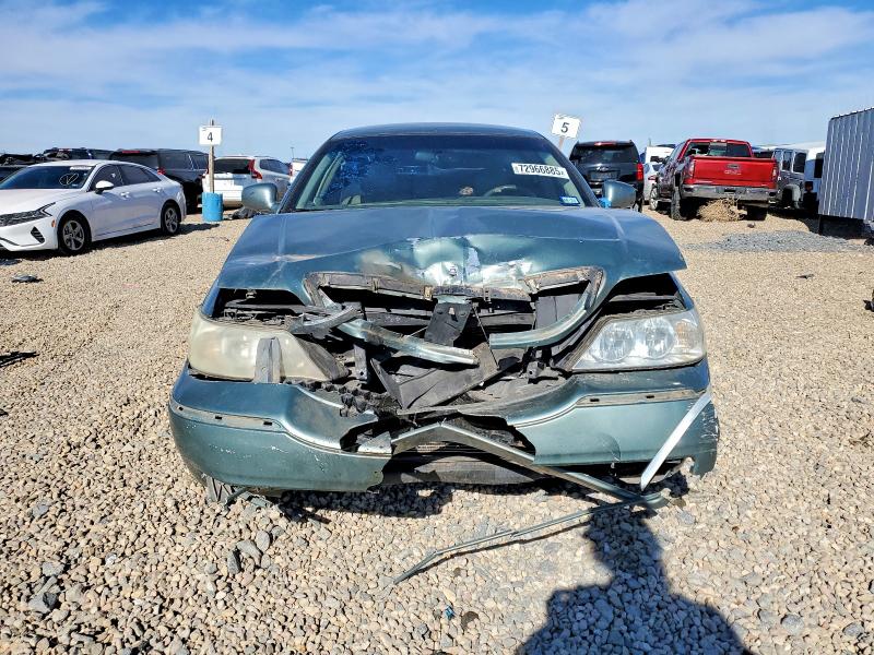Photo 5 from auction – 2004 LINCOLN TOWN CAR E with VIN 1LNHM81W64Y684662