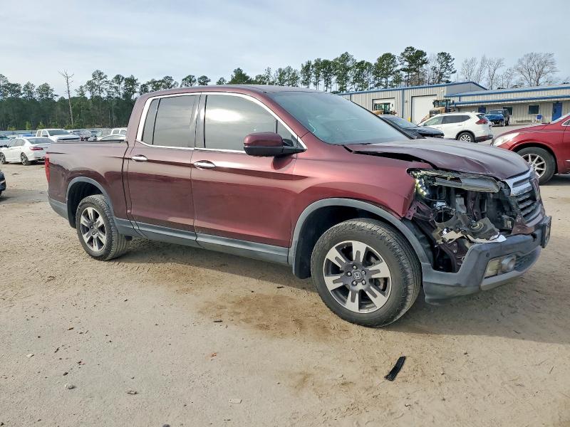 Фото 4 с аукциона – 2017 HONDA RIDGELINE с VIN 5FPYK3F76HB034029