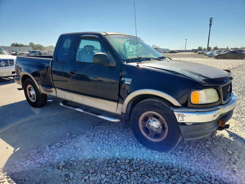 Photo 4 from auction – 2002 FORD F150 with VIN 1FTRX07WX2KB73853