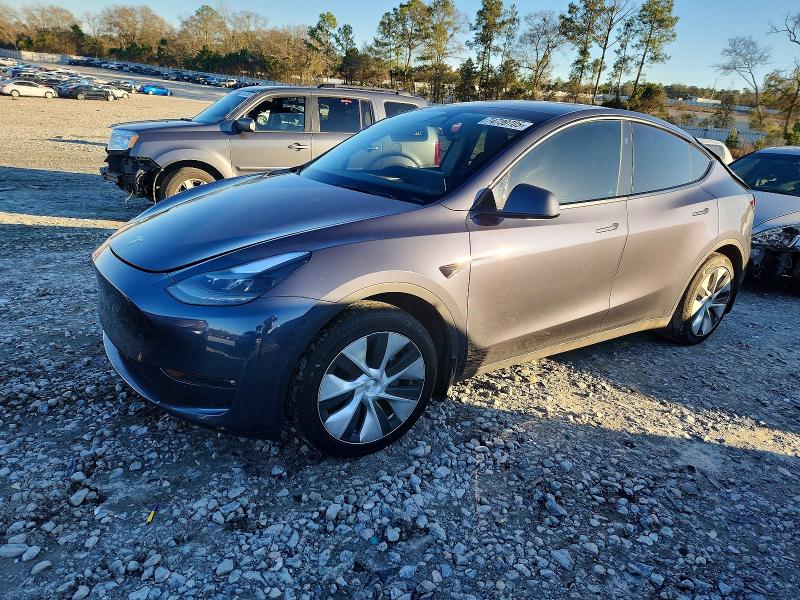 TESLA MODEL Y 2023 with VIN 7SAYGDED7PF957290 - Photo from auction