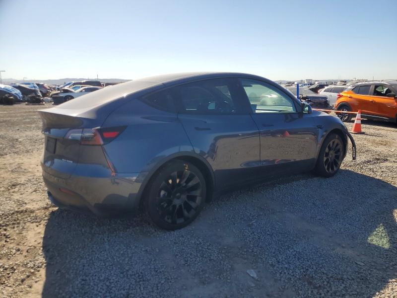 Photo 3 from auction – 2023 TESLA MODEL Y with VIN 7SAYGAEE3PF692701