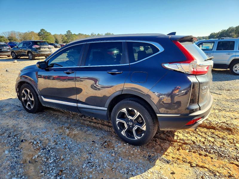 Photo 2 from auction – 2018 HONDA CR-V with VIN 7FARW1H98JE008711