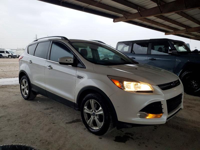 Photo 4 from auction – 2016 FORD ESCAPE SE with VIN 1FMCU0GX7GUA96048