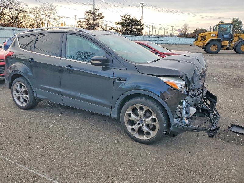 Photo 4 from auction – 2014 FORD ESCAPE TIT with VIN 1FMCU0JX3EUA54031
