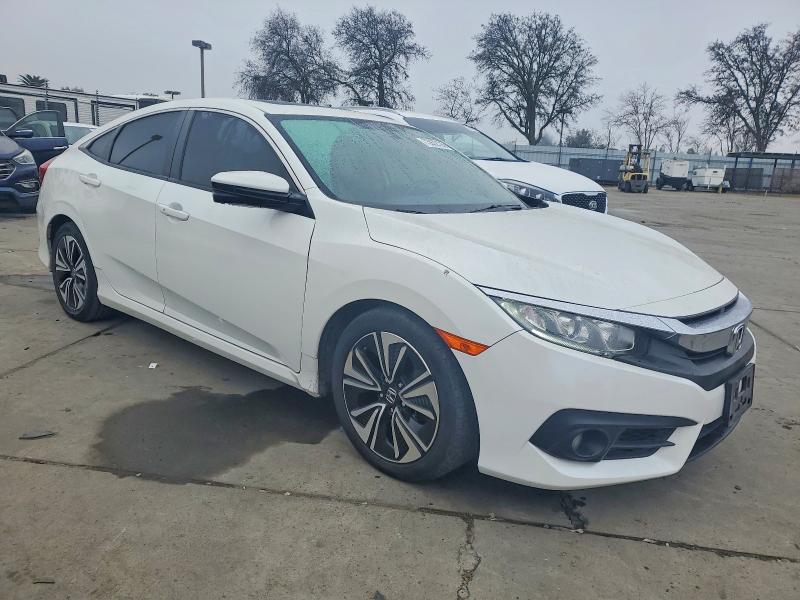 Photo 4 from auction – 2018 HONDA CIVIC with VIN JHMFC1F39JX035944