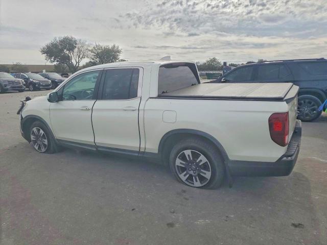 Photo 2 from auction – 2017 HONDA RIDGELINE with VIN 5FPYK2F65HB009558