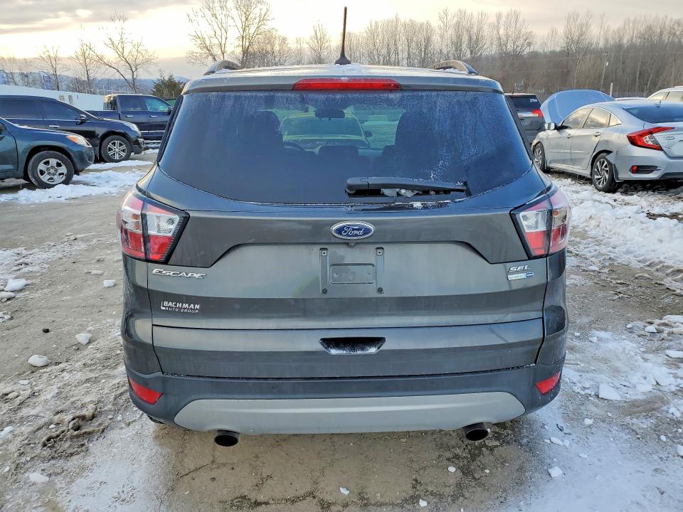 Foto 6 de la subasta – 2018 FORD ESCAPE con VIN 1FMCU9HD6JUB39424