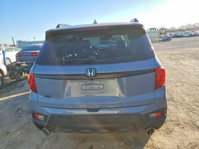 Photo 6 from auction – 2022 HONDA PASSPORT with VIN 5FNYF7H55NB003785