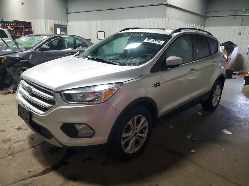 FORD ESCAPE SE 2018 with VIN 1FMCU9GD3JUA11112 - Photo from auction