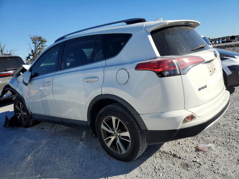 Photo 2 from auction – 2017 TOYOTA RAV4 with VIN JTMWFREV5HJ137412
