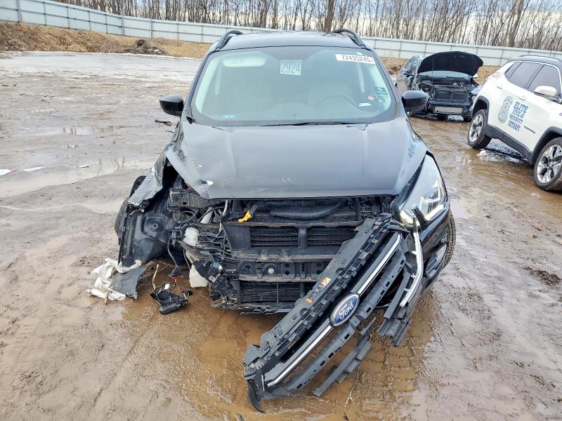 Photo 5 from auction – 2017 FORD ESCAPE with VIN 1FMCU9GD4HUE70661