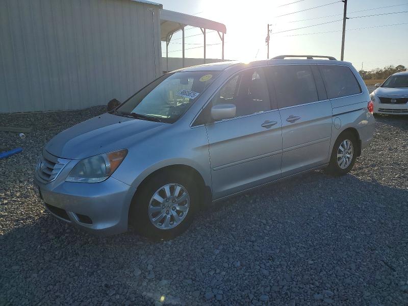 HONDA ODYSSEY EX 2010 with VIN 5FNRL3H66AB067374 - Photo from auction
