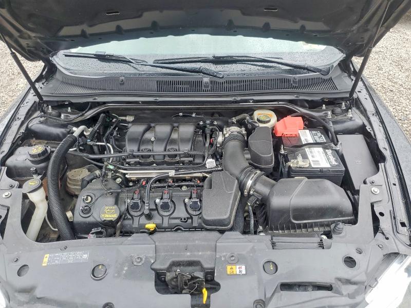 Photo 11 from auction – 2014 FORD TAURUS SEL with VIN 1FAHP2H88EG117026
