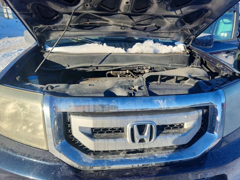 Photo 12 from auction – 2011 HONDA PILOT EXL with VIN 5FNYF3H55BB051307