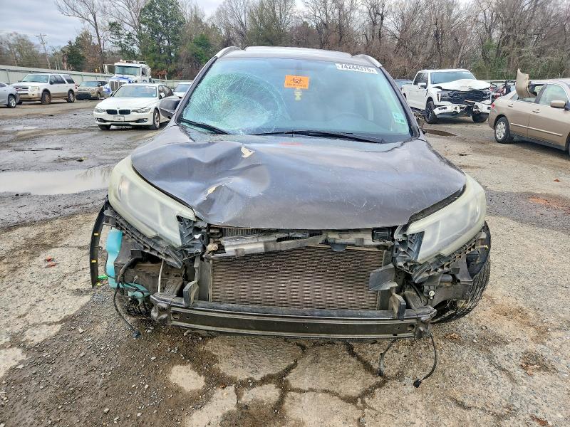 Photo 5 from auction – 2015 HONDA CR-V with VIN 2HKRM3H79FH538920