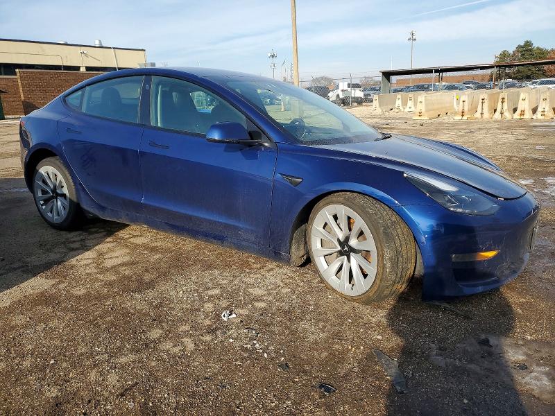 Photo 4 from auction – 2022 TESLA MODEL 3 with VIN 5YJ3E1EB4NF304973