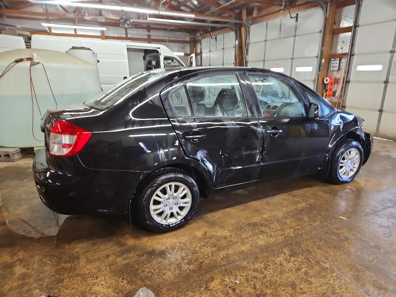 Photo 3 from auction – 2012 SUZUKI SX4 LE with VIN JS2YC5A39C6304080