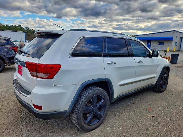 Photo 3 from auction – 2013 JEEP GRAND CHER with VIN 1C4RJECG2DC526449