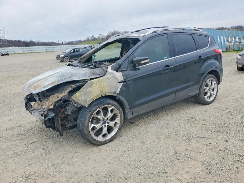 FORD ESCAPE 2014 with VIN 1FMCU0JX0EUB64535 - Photo from auction