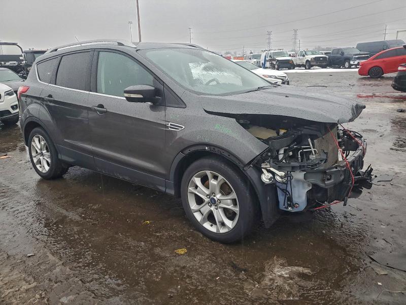 Photo 4 from auction – 2016 FORD ESCAPE TIT with VIN 1FMCU0J99GUB56387