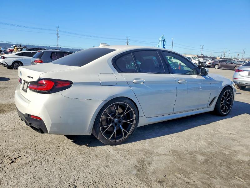 Photo 3 from auction – 2021 BMW M550XI with VIN WBA13BK03MCF77744