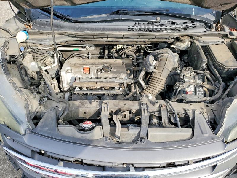 Photo 11 from auction – 2014 HONDA CR-V LX with VIN 2HKRM3H39EH530019